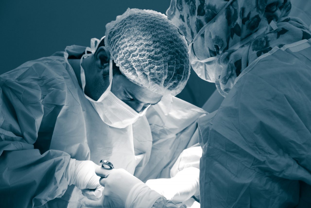 Two Surgeons performing surgery